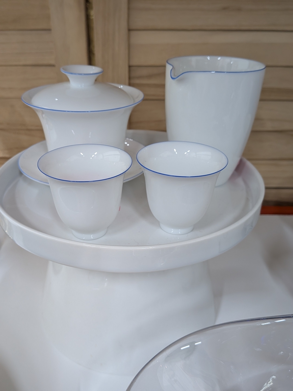 Red Blossom Tea Co. White Porcelain Tea Set with Delicate Blue Rim